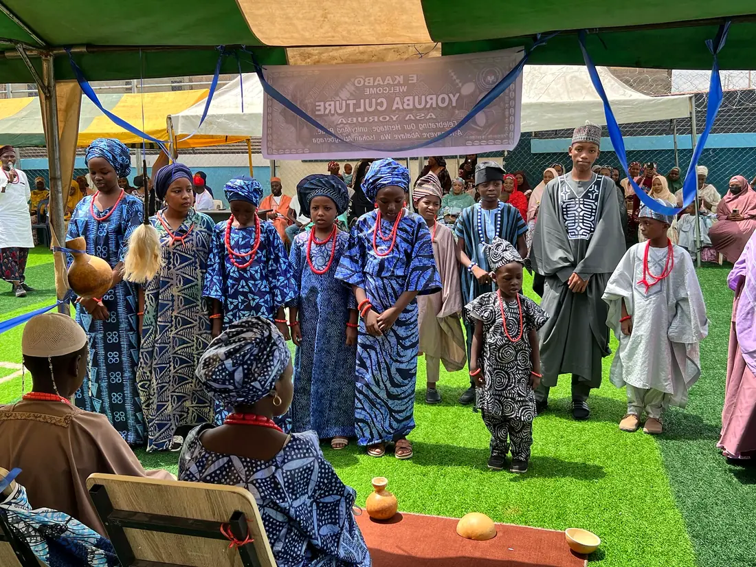 Pupils and staff in Yoruba attire at the cultural day
